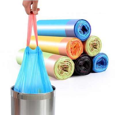 Plastic  disposable  drawstring trash bags on rolls for kitchen household can bins  garbage  disposal