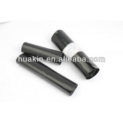 black plastic trash bags refuse sack on rolls