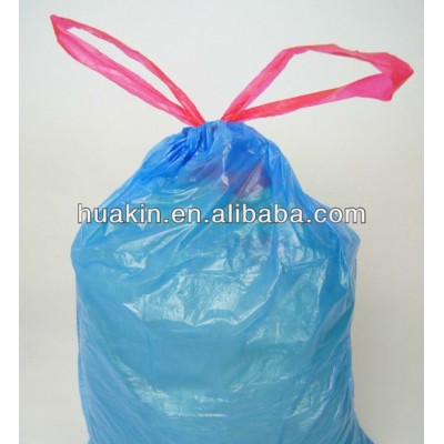 disposable drawstring garbage bags on rolls with cord